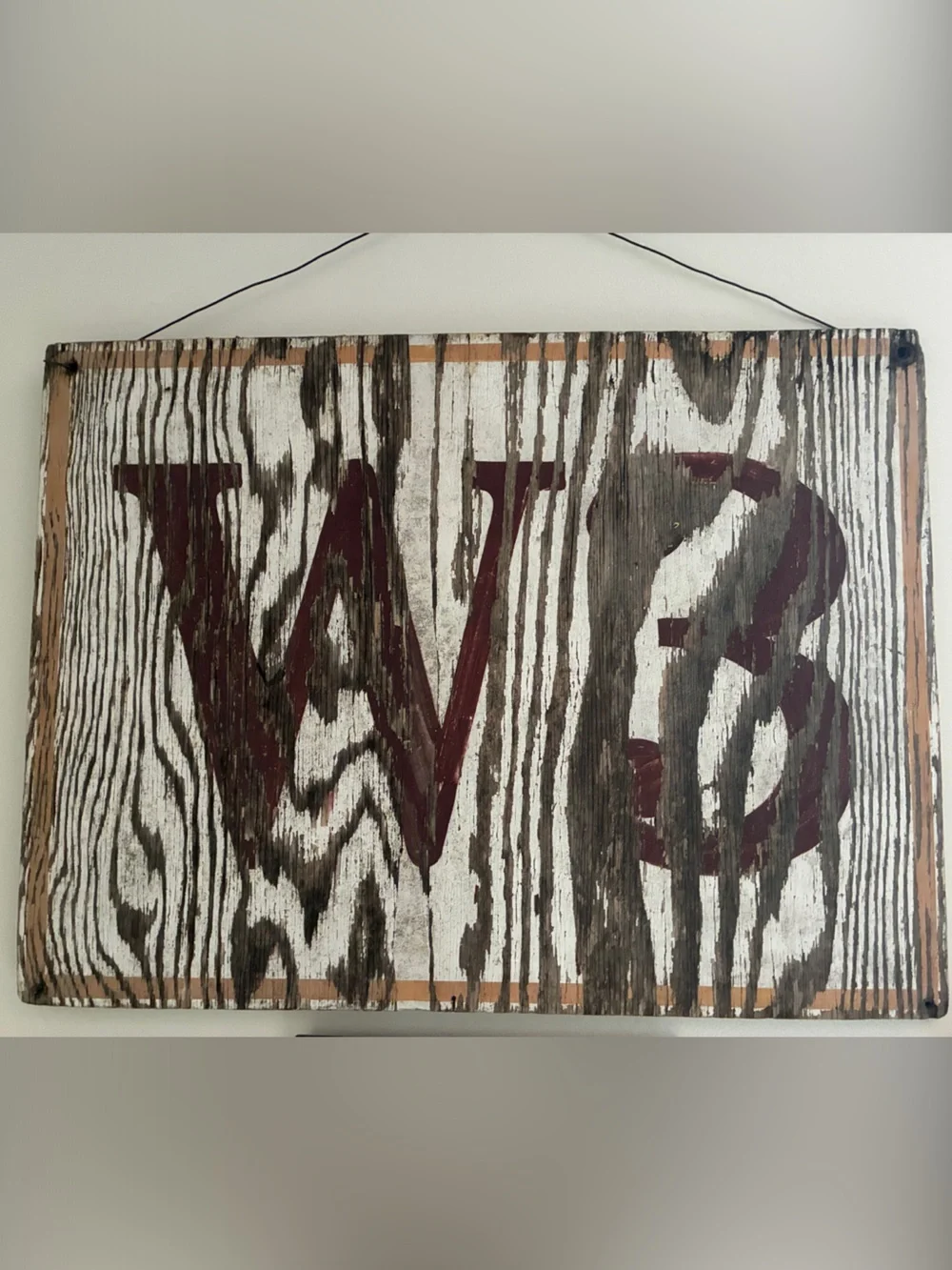 Rustic Wood Sign with Distressed Lettering